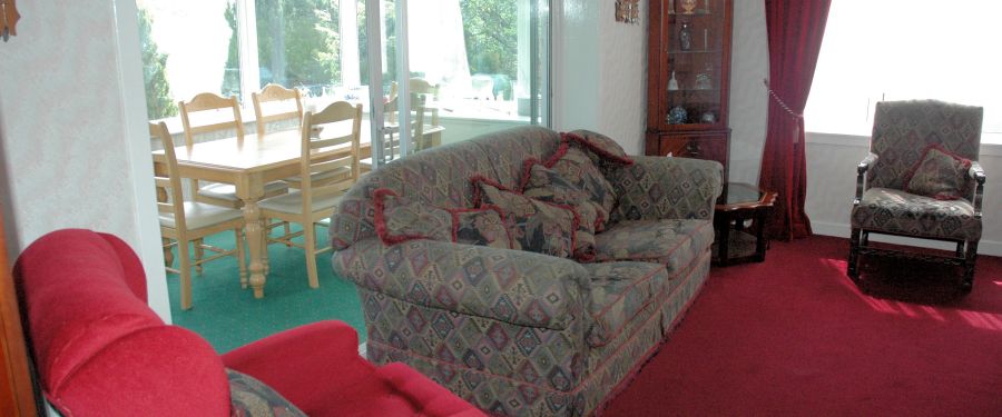 There is a large, spacious and comfortable lounge with doors leading in to the conservatory.